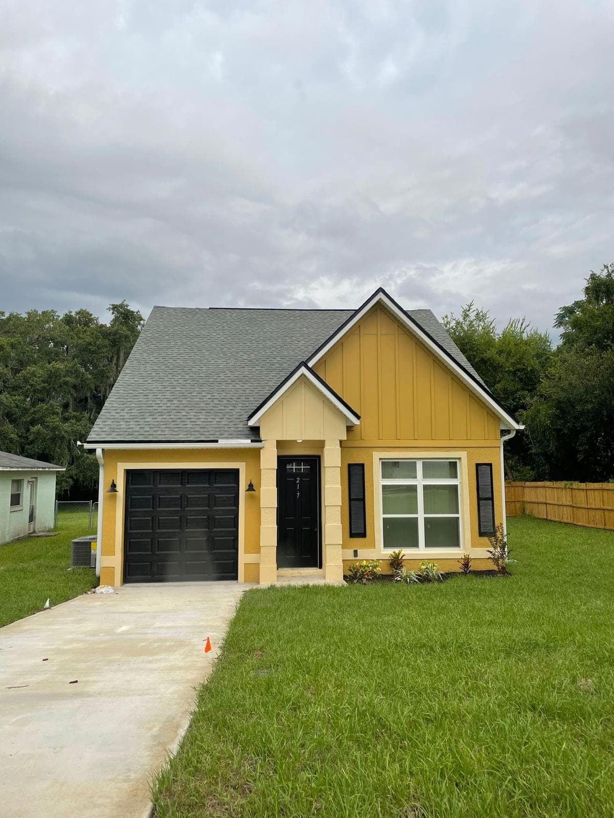 Completed single family home with professional landscaping